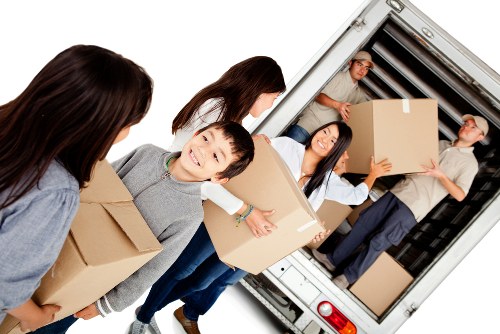 Removal team loading household goods for a UK moving service