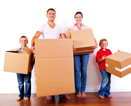 Large household furniture being loaded safely into a removal vehicle
