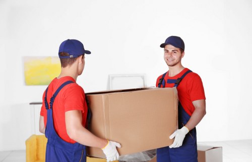 Removal team preparing boxes for a move in Wales