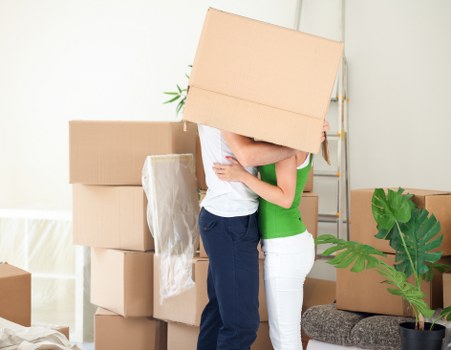 Efficient unpacking support helping a family settle into a new home in Wales